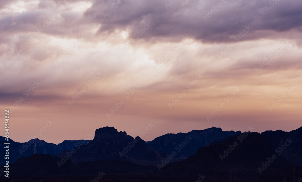 Brilliant Morning Light Fills The Sky Over The Chisos Mountains in Big Bend