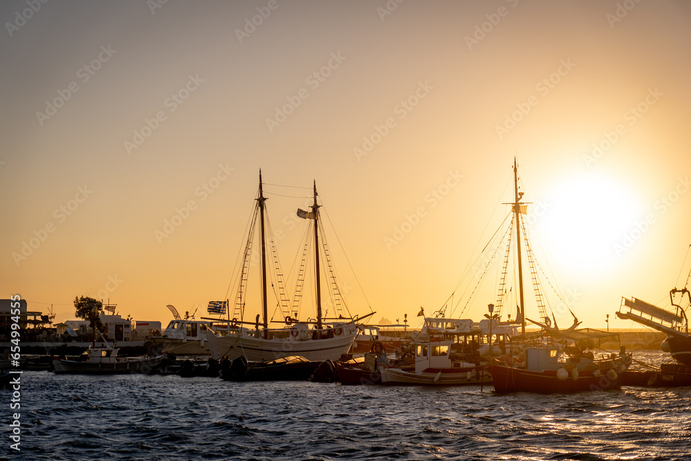 Pleasure boats in the old port of Mykonos at sunset