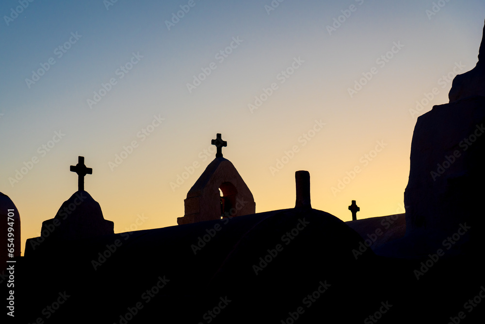 Orthodox crosses in the Panagia Paraportiani church at sunset