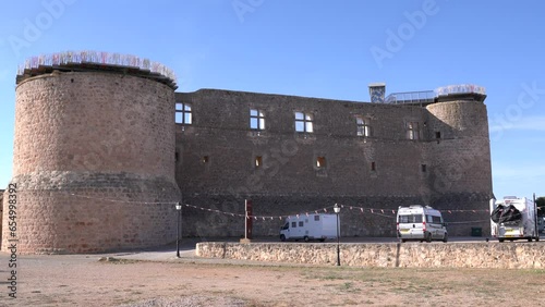 Motorhome reversing at spanish aire next to castle Castillo de Garcimunoz Cuenca, Castile-La Mancha, Spain