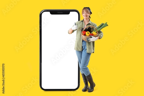 Big smartphone and female f...