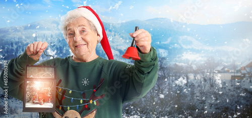 Senior woman in Santa hat, ...