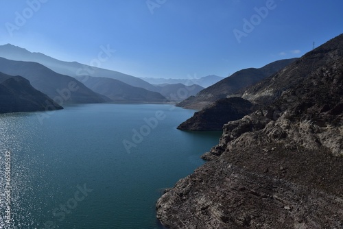 Reservoir in Elqui Valley, Chile: Man-made water body amid scenic landscapes, offering irrigation, recreation, and vital water resources.