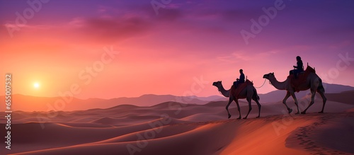 camels in the desert, Sahara, against the backdrop of a beautiful sunset, bright colors, screensaver for your computer desktop
