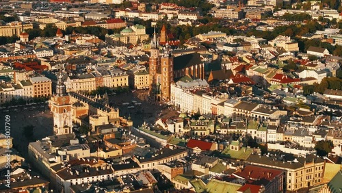 Old Europe Market Square. Kracow, Poland Aerial View. Market Square from above, aerial view of old city center view in Krakow with sunset. Main Market square or Rynek Glowny with a Town Hall. photo