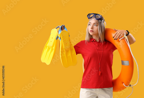 Female lifeguard with ring ...