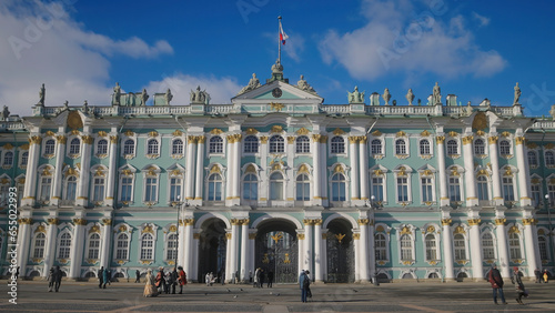 Beautiful facade of old palace building. Action. Facade of ancient palace on sunny summer day. Beautiful architecture of old building of St. Petersburg Hermitage