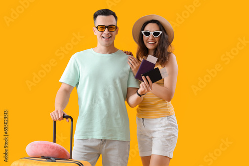 Young couple with passports...