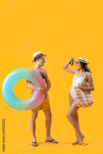 Young couple with inflatabl...