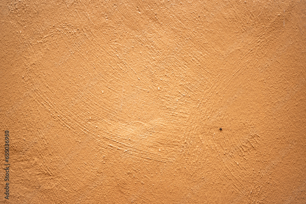Mur de façade crépi et peint en brun orangé. - obrazy, fototapety, plakaty 