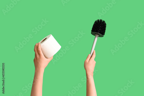 Hands holding toilet paper ...
