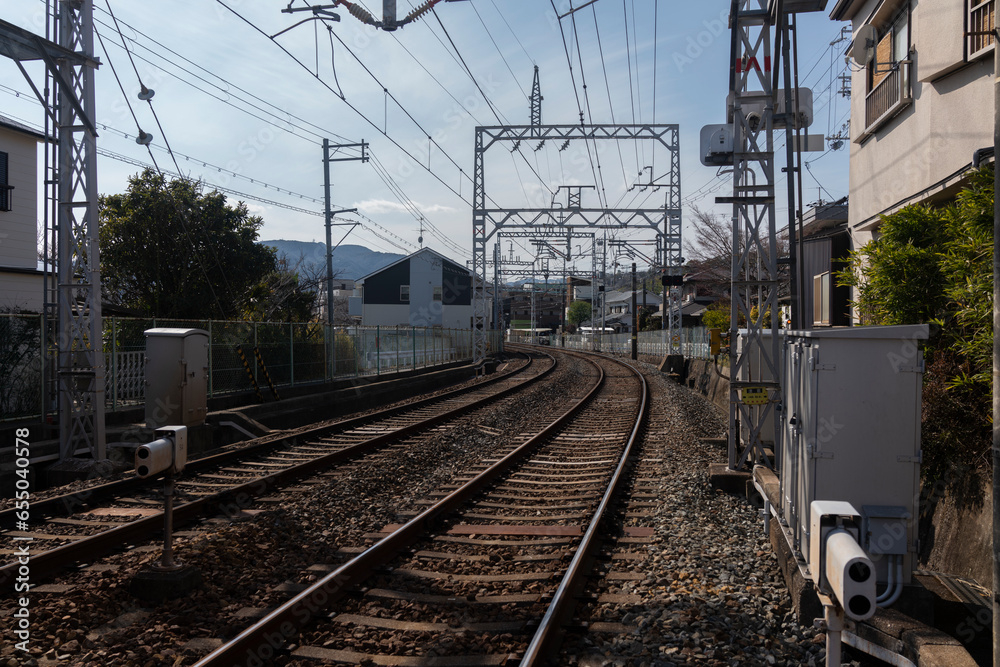 Skyward Currents: Transmission Towers Beneath Azure Skies