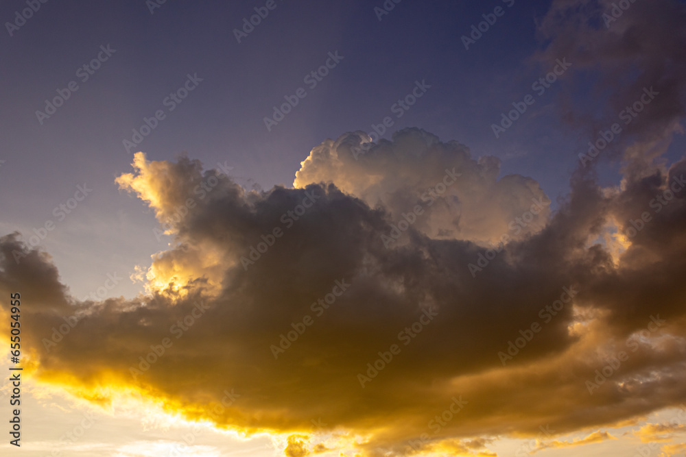 Fototapeta premium beautiful big clouds at sunset