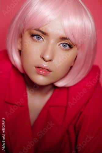 Portrait of a Young Woman with a Pink Bob: A Chic Expression of Modern Femininity. Ideal for Fashion, Beauty, and Hairstyling Promotion.