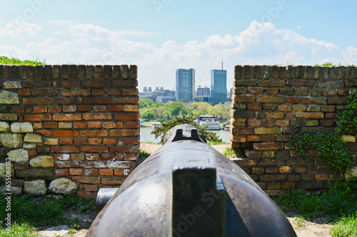 Old cannon on the fortress wall, rear view. Concept: history, defense. 