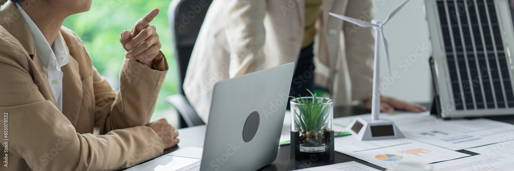 Fototapeta premium Alternative energy environment businesspeople discuss and brainstorm about project of power future