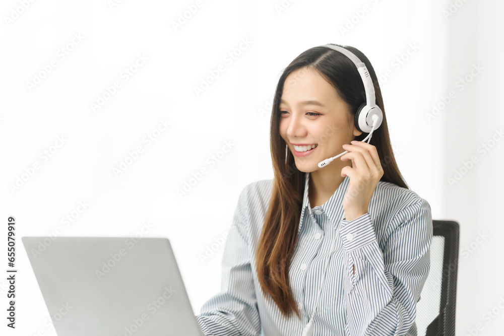 Asian people call center agent in serene work environment, expertly handling client issues via her laptop at organized workspace. representation of modern telecommunication pivotal role in business. Asian people call center agent in serene work environment, expertly handling client issues via her laptop at organized workspace. representation of modern telecommunication pivotal role in business.