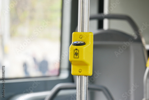 Mobile phone charger with usb in public transport 