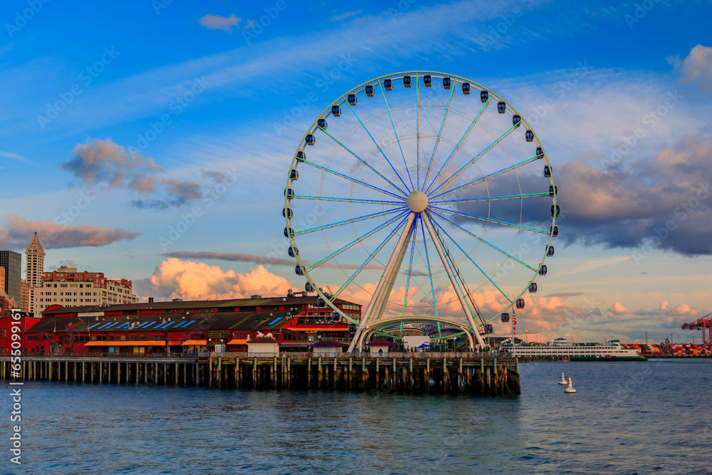 Waterfront skyline with the Great Wheel, the Puget Sound at sunset, Seattle, WA
