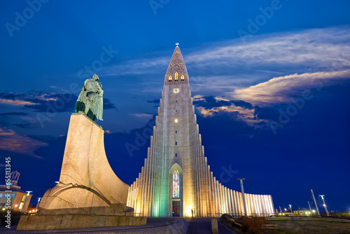 Hallgrimskirkja lutheran church and Skolavorduholt statue at dusk, Reykjavik, Iceland photo