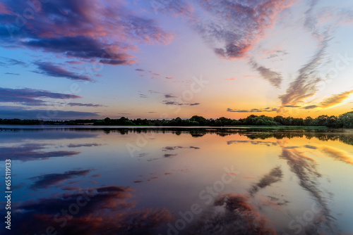 Fantastic reflection of the clouds on the lake, sunset, Wintersett Reservoir photo