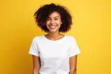 A cheerful young African-American woman with a bright smile and stylish, curly hair against a white background.