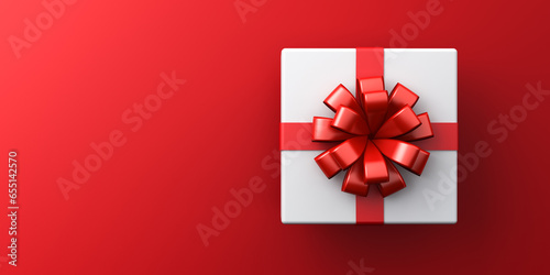White gift box or top view of white present box tied with red ribbon bow isolated on dark red background with empty space on the left side minimal conceptual 3D rendering