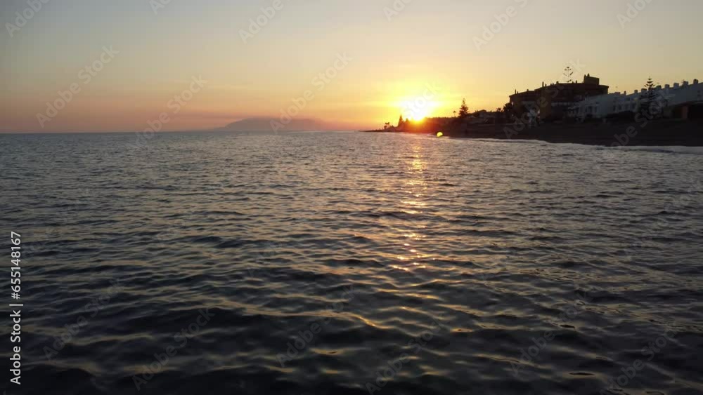 View of sea and Malaga mountain over sea water from Chilches at sunset View of sea and Malaga mountain over sea water from Chilches at sunset