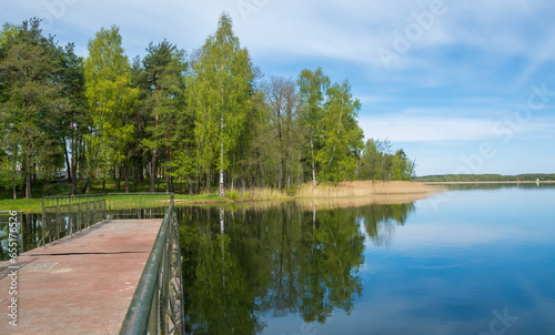 Metal pontoon bridge on the lake Braslav , Belarus.