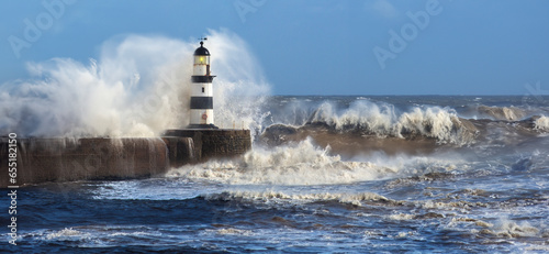 Waves crashing over Seaham Lighthouse in the northeast of England.