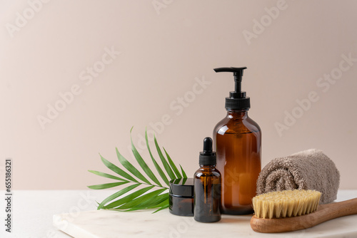 Facial serum, jar of cream, gel or lotion for skin care on light background. Beauty natural organic products concept