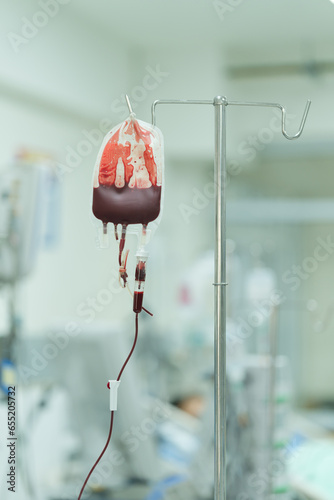 The patient is receiving blood components to replace lost blood to prevent hypovolemic shock. photo