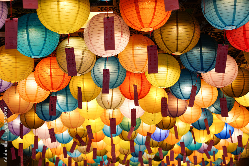 Fototapeta premium There were many large, round, multi-colored lamps on the ceiling.