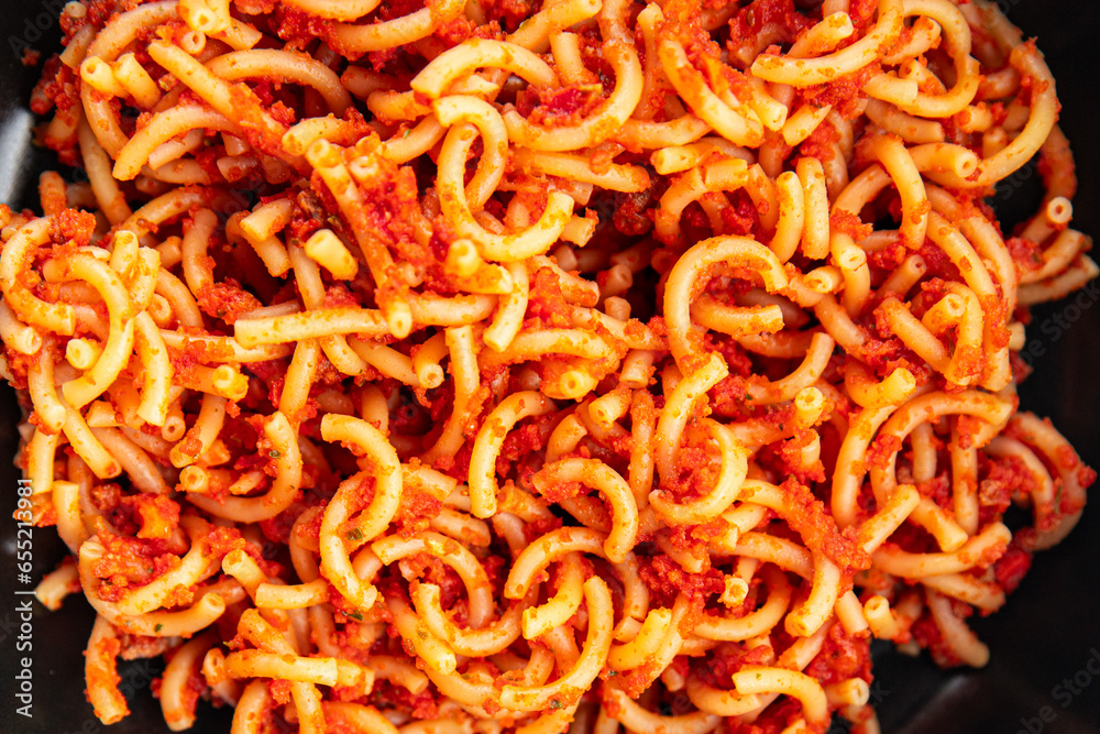bolognese pasta sedanini rigati tomato sauce healthy eating cooking appetizer meal food snack on the table copy space