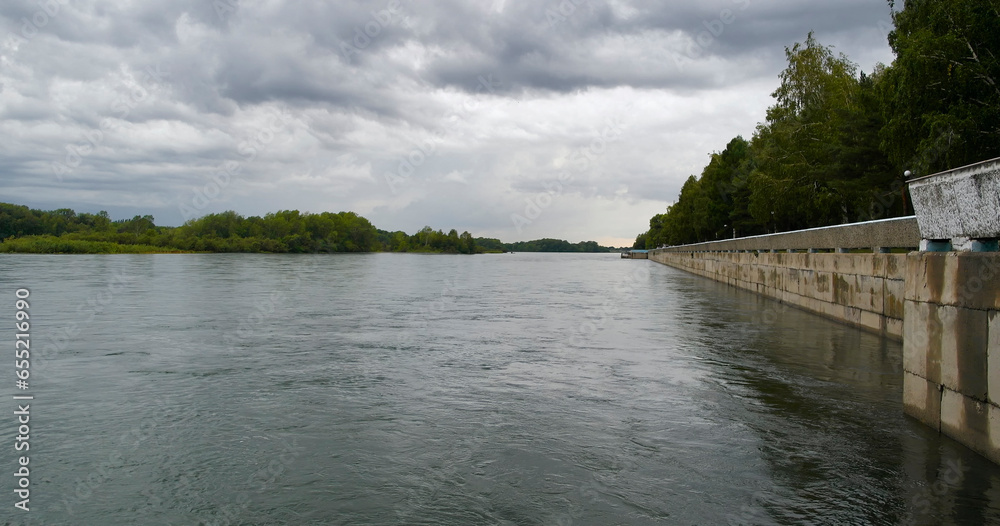 Fototapeta premium Embankment of Irtysh River in the city of Ust-Kamenogorsk(kazakhstan). Emabnkment of the river. City spring landscape