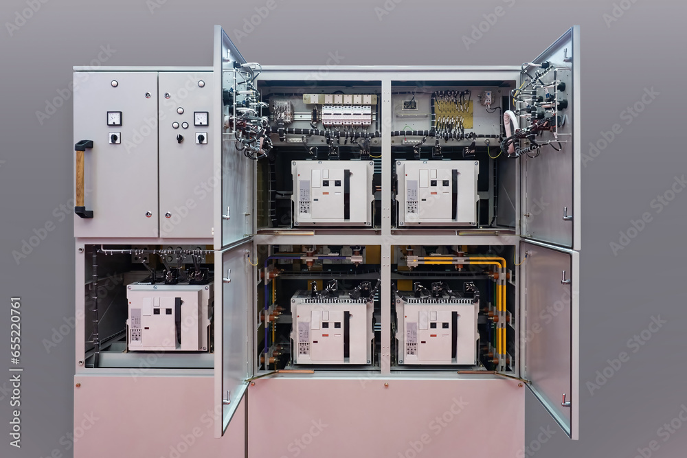 Electrical equipment for automation. Steel cabinet with electrical equipment. Power equipment for factory. Automation cabinet near wall. Electro technologies to increase production productivity - obrazy, fototapety, plakaty 