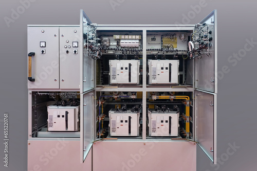 Electrical equipment for automation. Steel cabinet with electrical equipment. Power equipment for factory. Automation cabinet near wall. Electro technologies to increase production productivity