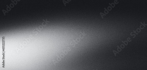 Black white grainy gradient background illuminated spot on dark gray noise texture banner header poster backdrop copy space