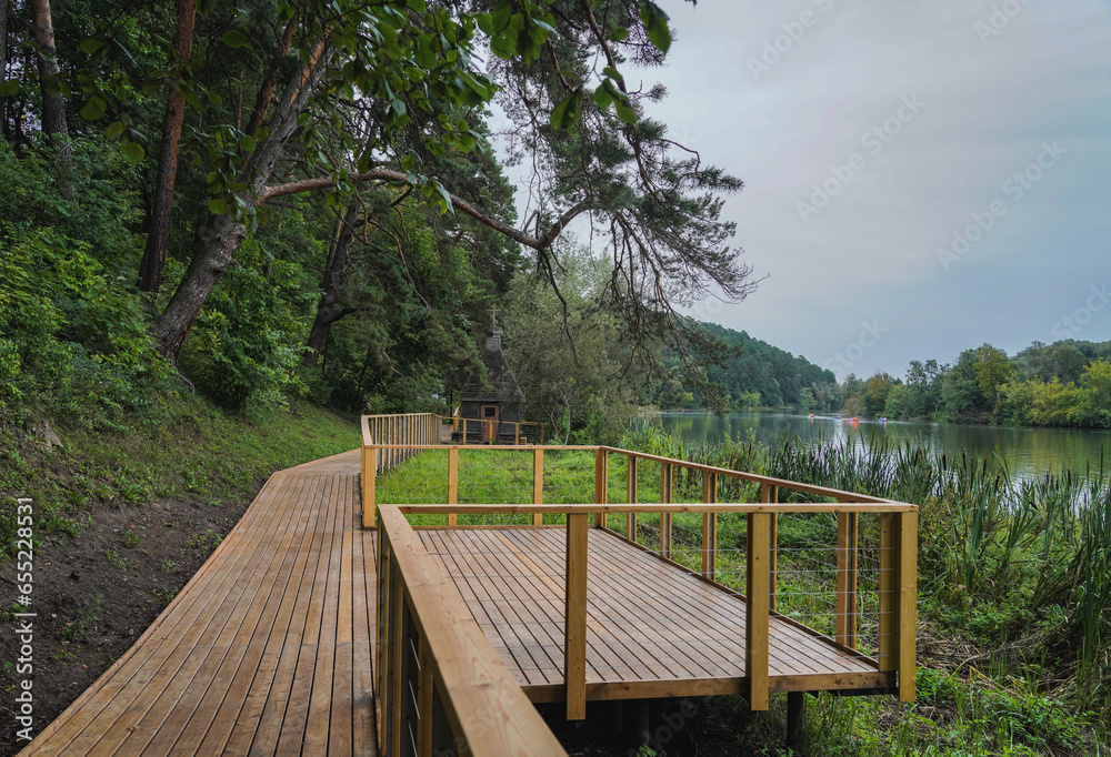 wooden bridge over the river