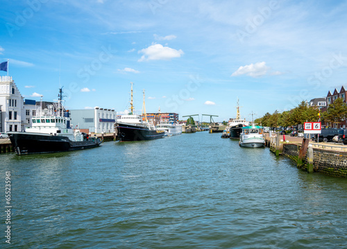 Tugboats and cruise ships in the harbour of Maassluis near Rotterdam, Netherlands  © Gert-Jan van Vliet
