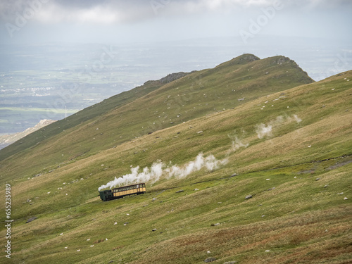 Views around Snowdon with trains running up to the summit photo