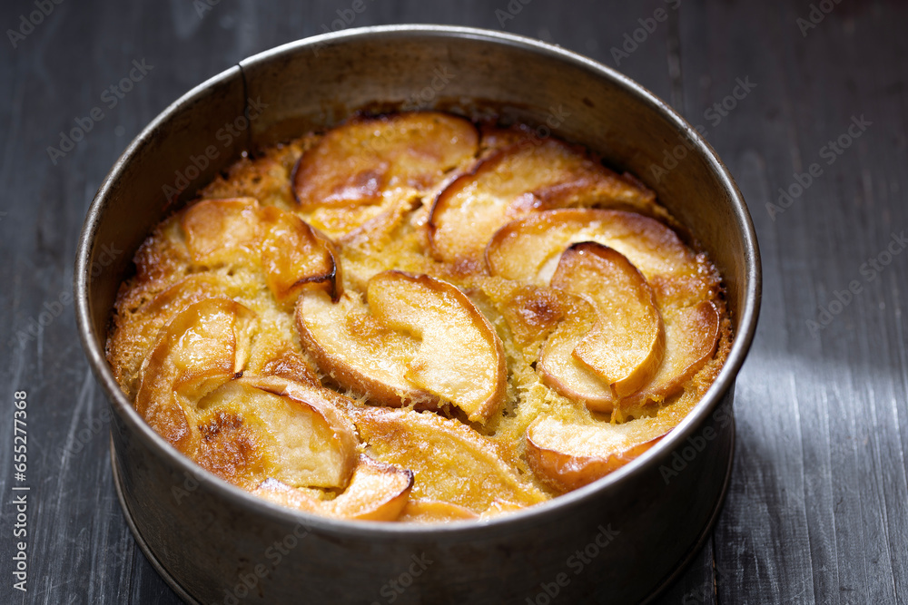 rustic apple cake in baking tin