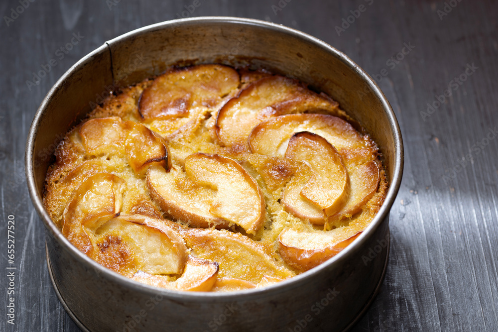 rustic apple cake in baking tin