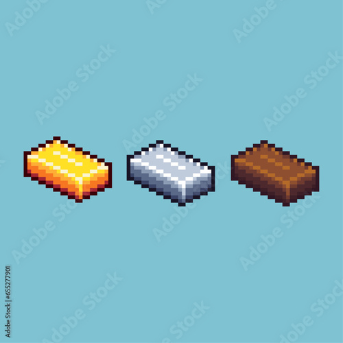 Pixel art sets of gold,silver,and bronze ingot with variation color item asset. Simple bits of ingot on pixelated style. 8bits perfect for game asset or design asset element for your game design asset