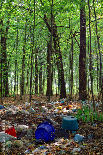 Environmental pollution with waste, garbage in the forest