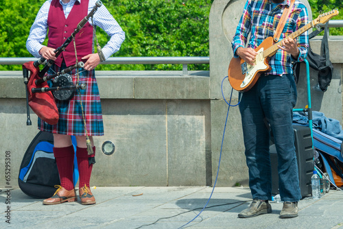 music Players along the Edinburgh street, Scotland photo