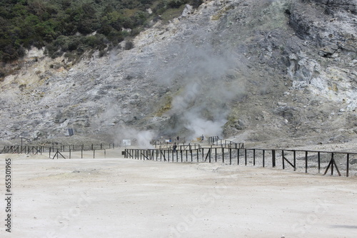 Pozzuoli, the super active volcano of the Campi Flegrei. The solfatara is the only visible mouth with its fumaroles, while the whole city suffers the effects of bradyseism. photo