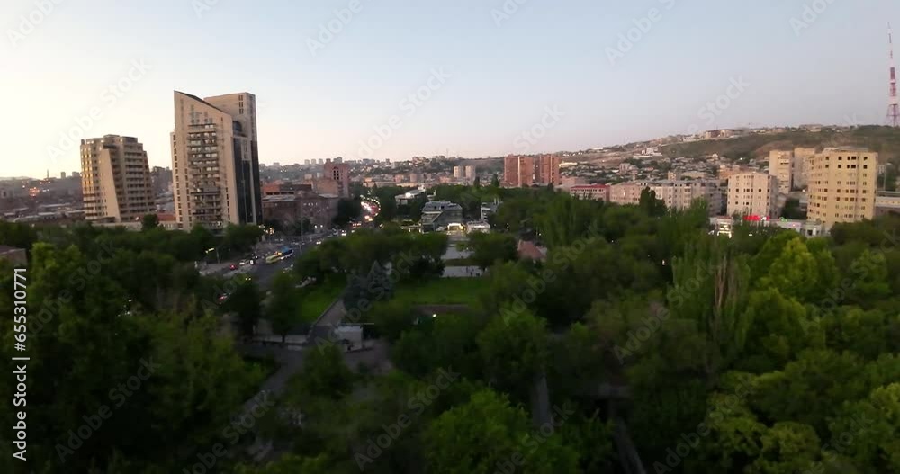 Aerial view captures the beauty of a park in Yerevan, revealing lush greenery and recreational spaces in the heart of the city. Aerial view captures the beauty of a park in Yerevan, revealing lush greenery and recreational spaces in the heart of the city.