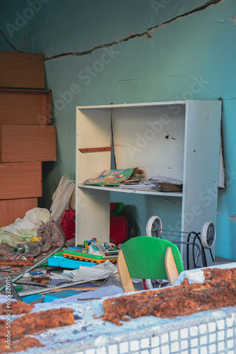 Children's things are scattered around the kindergarten destroyed after the explosion