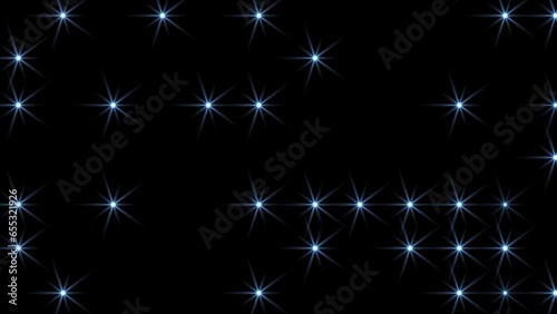 christmas wall pattern with flickering and glowing holiday lights. Blue stars shiny in black background